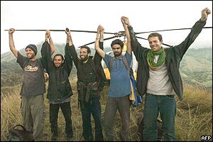 The five hostages with Mark Henderson on left before they get on a helicopter.
