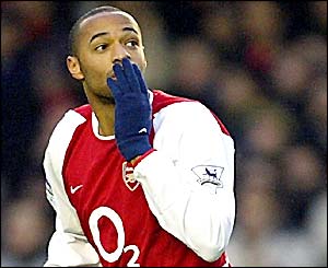 Thierry Henry blows a kiss to the crowd