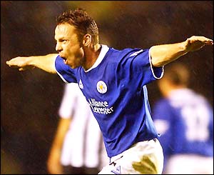 Paul Dickov celebrates his goal