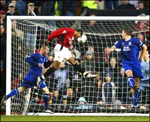 Brazilian Kleberson restores United's lead just before half-time with a downward header from Gary Neville's cross