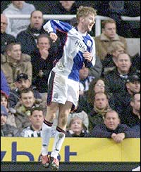 Paul Gallagher celebrates his goal for Blackburn