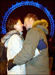 Emma Williams and Tony Clarke from Essex embrace on Victoria Embankment 