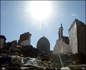 While the Djame mosque, background, is intact, most of the surrounding houses are levelled by the earthquake