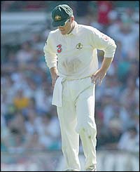 Australia spinner Stuart MacGill looks forlorn as another delivery heads to the boundary