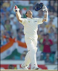 India's Sachin Tendulkar looks to the skies in delight as he passes 200 runs