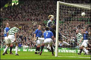 Stanislav Varga heads home Celtic's second goal on the hour