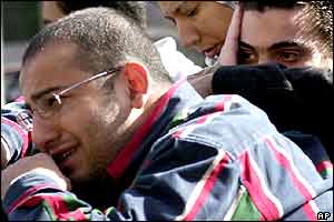 Distraught relatives of the Egyptian crew outside the Cairo offices of Flash Airlines.