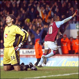 Despair for Pavel Srnicek and Portsmouth as Darius Vassell claims a freak winner 