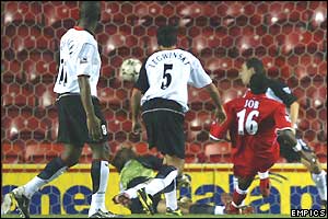 Joseph Desire Job (right) pokes the ball home to score for Middlesbrough