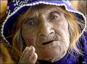 Earthquake survivor Shahr-Banu Mazandarani rests in a field hospital, 6 January, three days after her rescue from under the rubble of her destroyed home