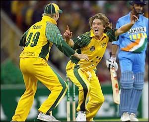 Australia's Ian Harvey and Matthew Clarke celebrate the wicket of India's Sourav Ganguly