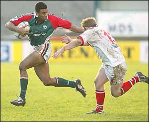 Neil Baxter of Leicester fends off Ulster's Shane Stewart 