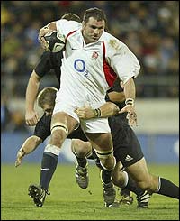 Martin Johnson charges at the New Zealand defence during the encounter in Wellington