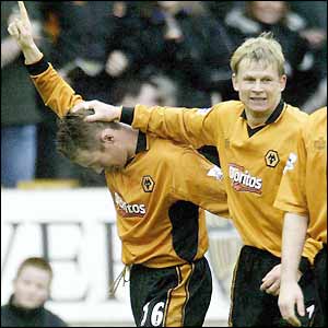 Kenny Miller celebrates scoring the winner at Molineux