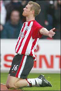 Saints striker Brett Ormerod celebrates his goal against Leeds