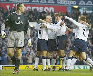 Spurs players congratulate Helder Postiga after he scored against Liverpool
