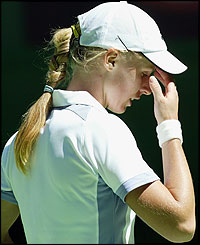 Elena Dementieva rues her form in her defeat to Jelena Jankovic