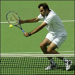 Greg Rusedski loses in straight sets to Albert Costa