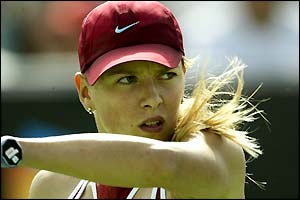 Maria Sharapova keeps her eye on the ball after playing a backhand