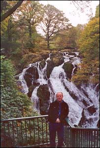 Clare Scotcher took this picture of her boyfriend Barry Cartwright in front of Swallow Falls in north Wales 