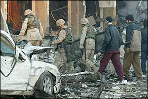 American troops outside bombed hotel