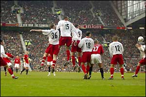 Louis Saha's free-kick deflects off Kevin Phillips and into the net