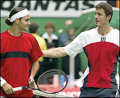 Roger Federer (left) and Marat Safin