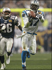 Mushin Muhammad connects with Jake Delhomme's sensational 85-yard touchdown pass