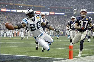 DeShaun Foster touches down for Carolina after a 33-yard run