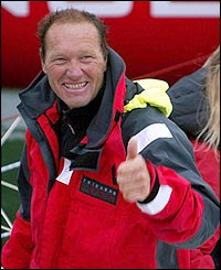 Joyon gives the thumbs up as he arrives back on dry land