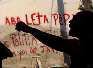 A student chants anti-government slogans in Haiti