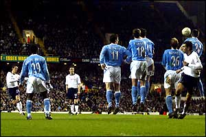 Christian Ziege (left) curls home a free-kick for Tottenham