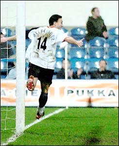 Steed Malbranque wheels away after scoring the winner for Fulham