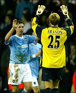 Arni Arason and Robbie Fowler celebrate the dramatic victory