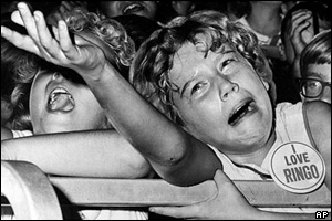 ... and at concerts the screaming and hysteria of the fans became so common place it eventually led to the band stopping perfuming.