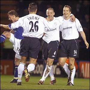 Bolton celebrate their equaliser - a bizarre own goal by Leicester keeper Ian Walker