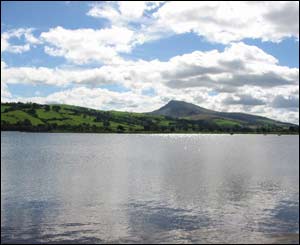 A mirror-like Lake Bala on a clear still day, taken by Chris Burtenshaw from Aberystwyth