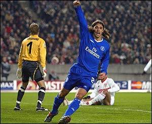 Argentina and Chelsea striker Hernan Crespo wheels away in delight