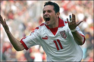 Dos Santos celebrates his fourth goal of the tournament