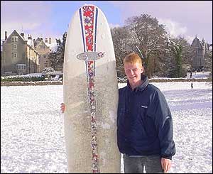 James Tabern, 21, a member of Bangor University's surfing club swaps the sea for snowy slopes