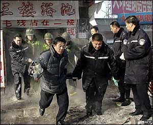 Firefighters evacuate victim from store, Jilin