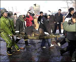 Victim being carried on stretcher