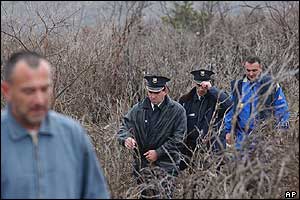 A rescue team of local policemen and mine clearance experts