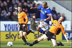 Marcus Bent tries to dribble through the Wolves defence