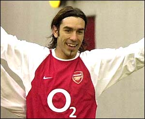 Robert Pires celebrates his opening goal for Arsenal