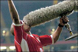 Earnshaw grabs a microphone as he celebrates his second goal