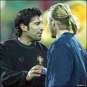 Real Madrid colleagues Luis Figo of Portugal and England captain David Beckham 