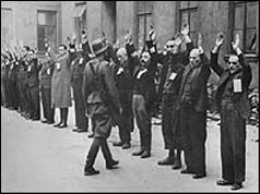 SS soldier inspects Jewish workers - April 1943