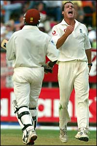 Ridley Jacobs walks after being dismissed by Simon Jones