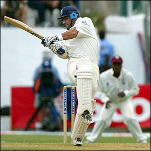 England's Graham Thorpe thumps the ball to the boundary